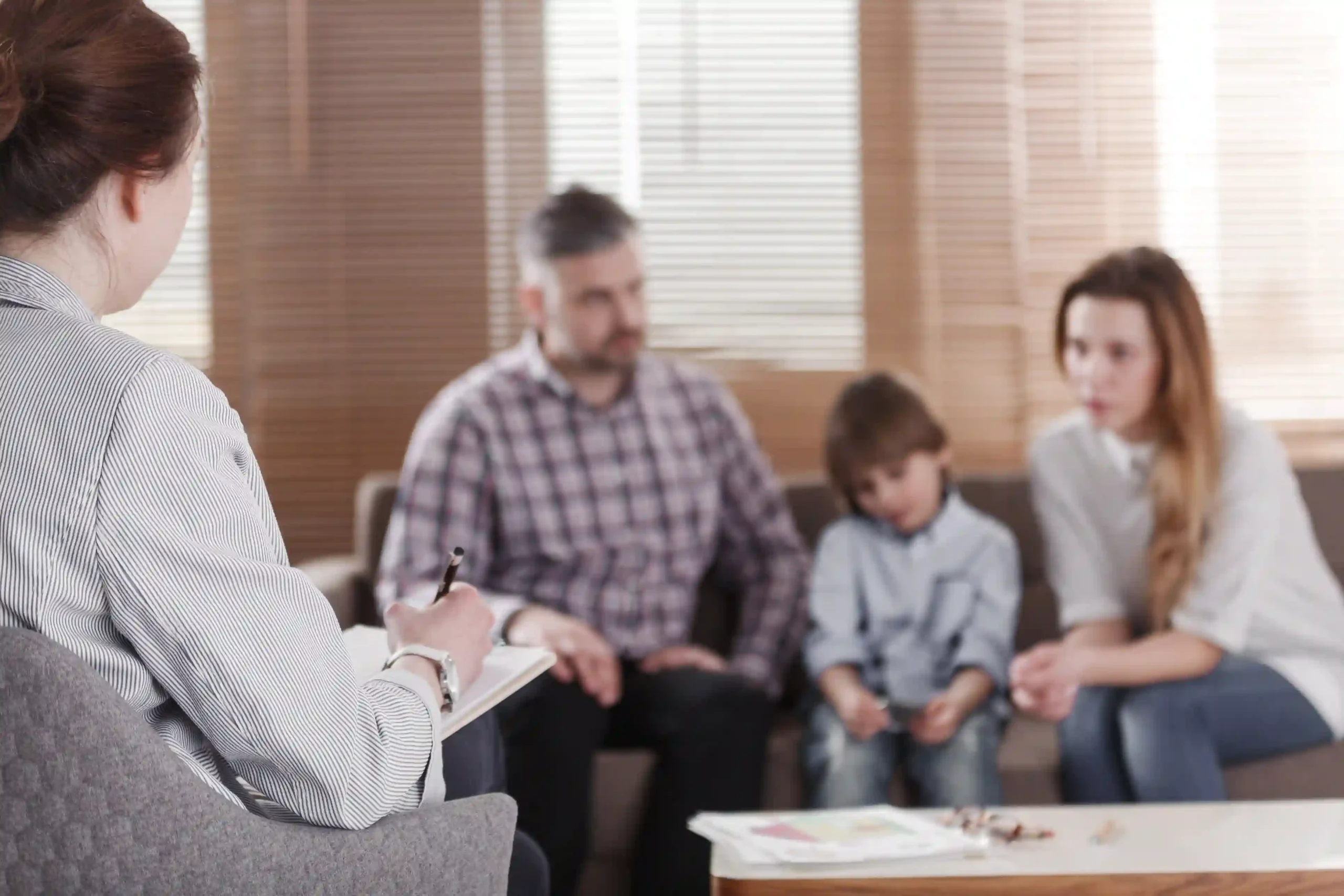 Family sat together talking about addiction