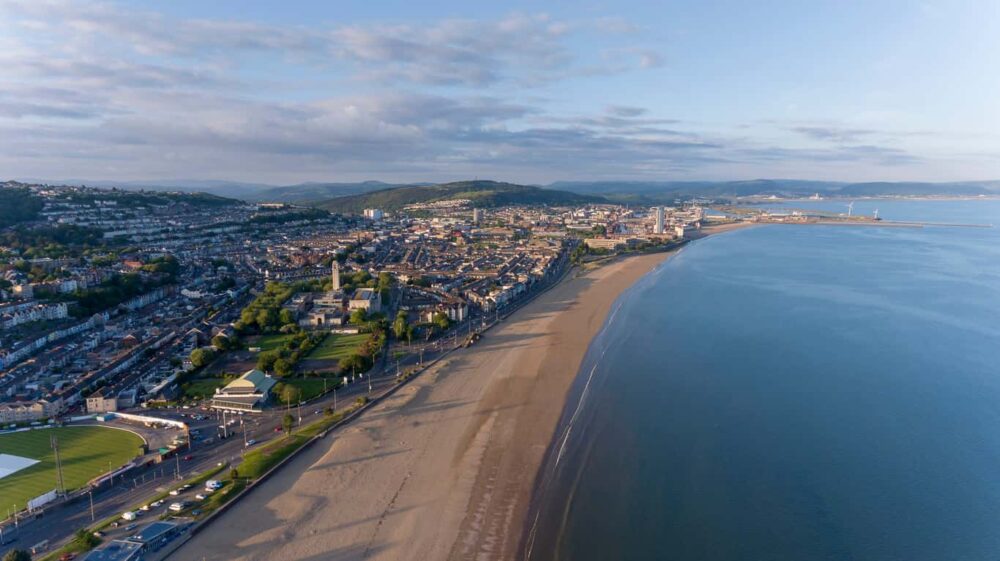 an aerial from the beach, near a drug and alcohol rehab in swansea