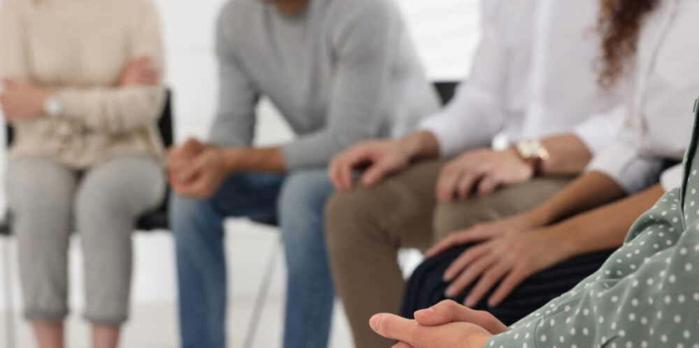 Group therapy session at rehab in Peterborough